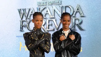 Letitia Wright poses with her new wax figure as Black Panther.